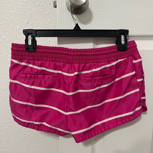 Selling swimsuit cover up shorts, size small. Hot pink with white stripes. - Picture 2 of 3